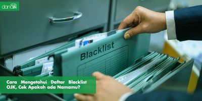 danain-Daftar blacklist OJK-gambar seseorarng memegang blacklist